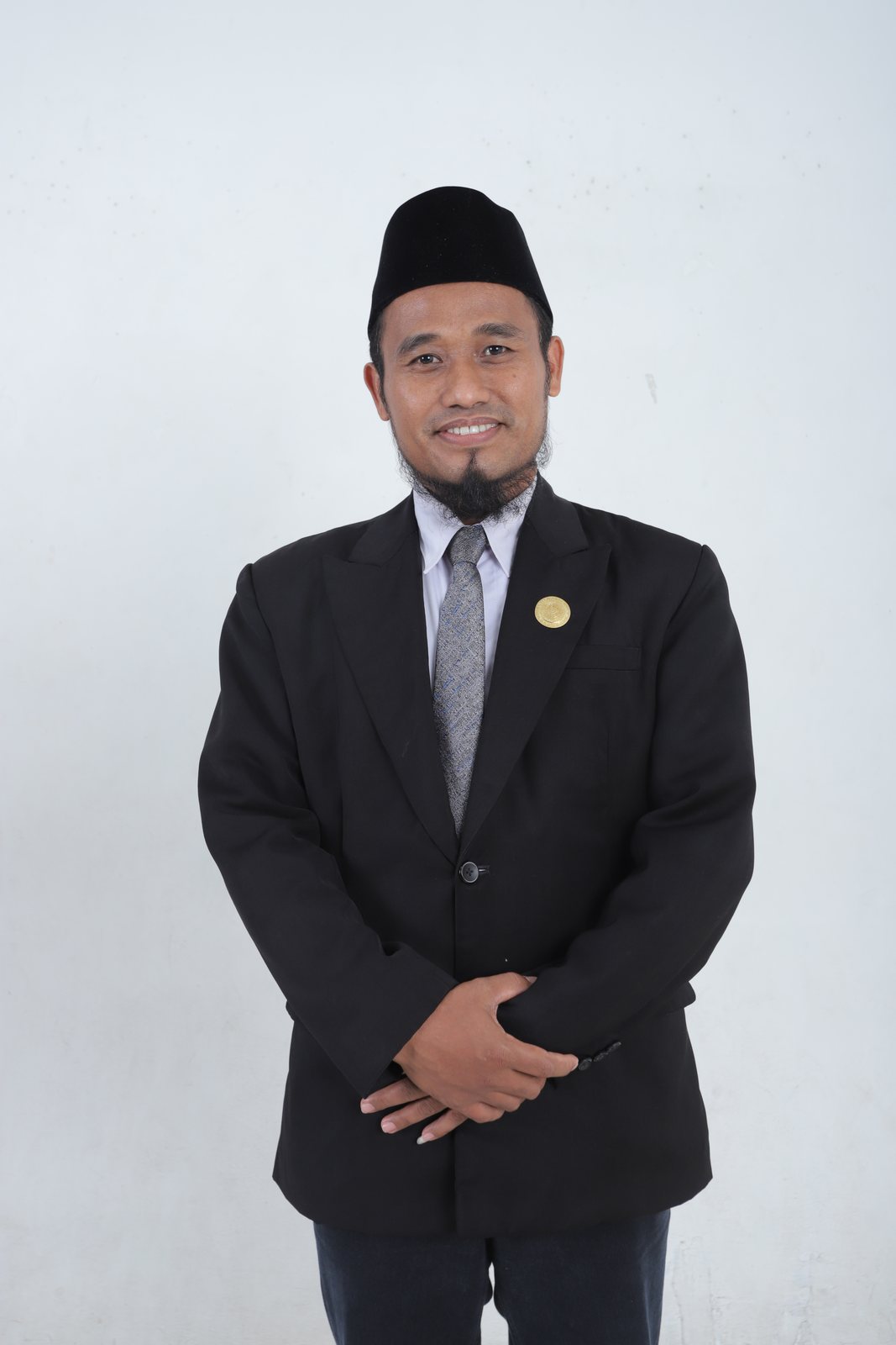 Foto Dr. Joni, S.E.I., M.E.Sy.