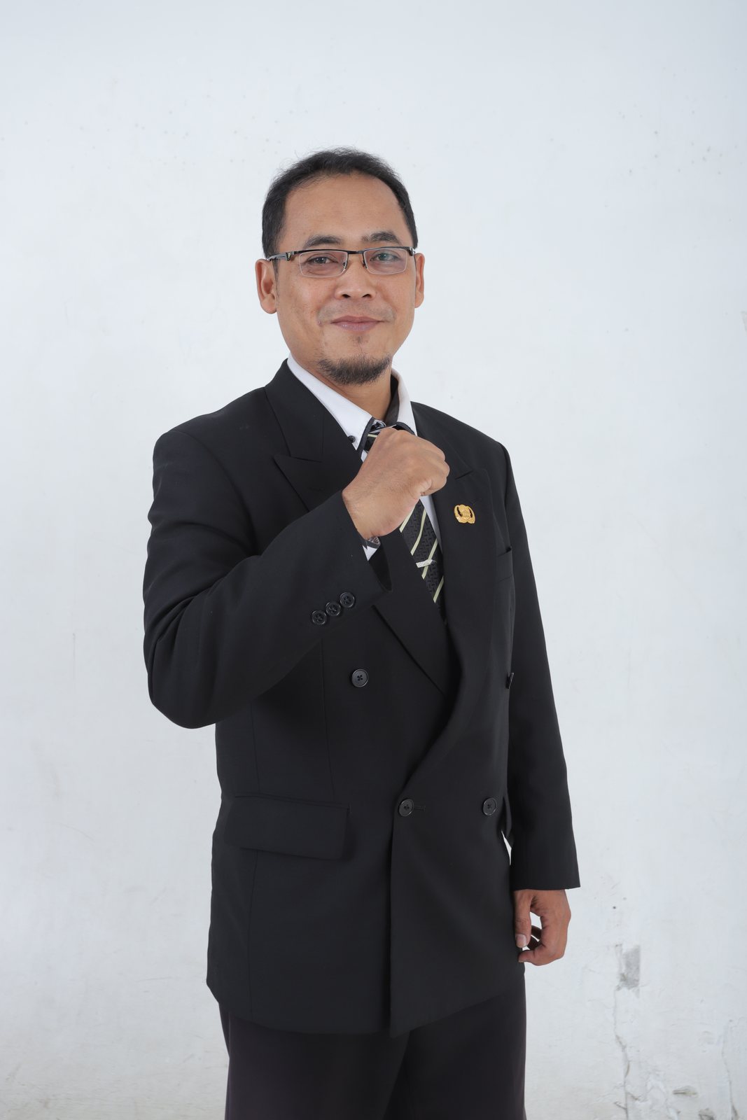 Foto Trisna Wijaya, S.E.I., M.E.Sy.